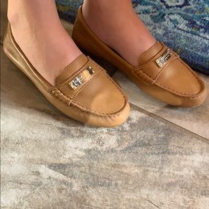 Coach loafers / flats, saddle brown / light brown.